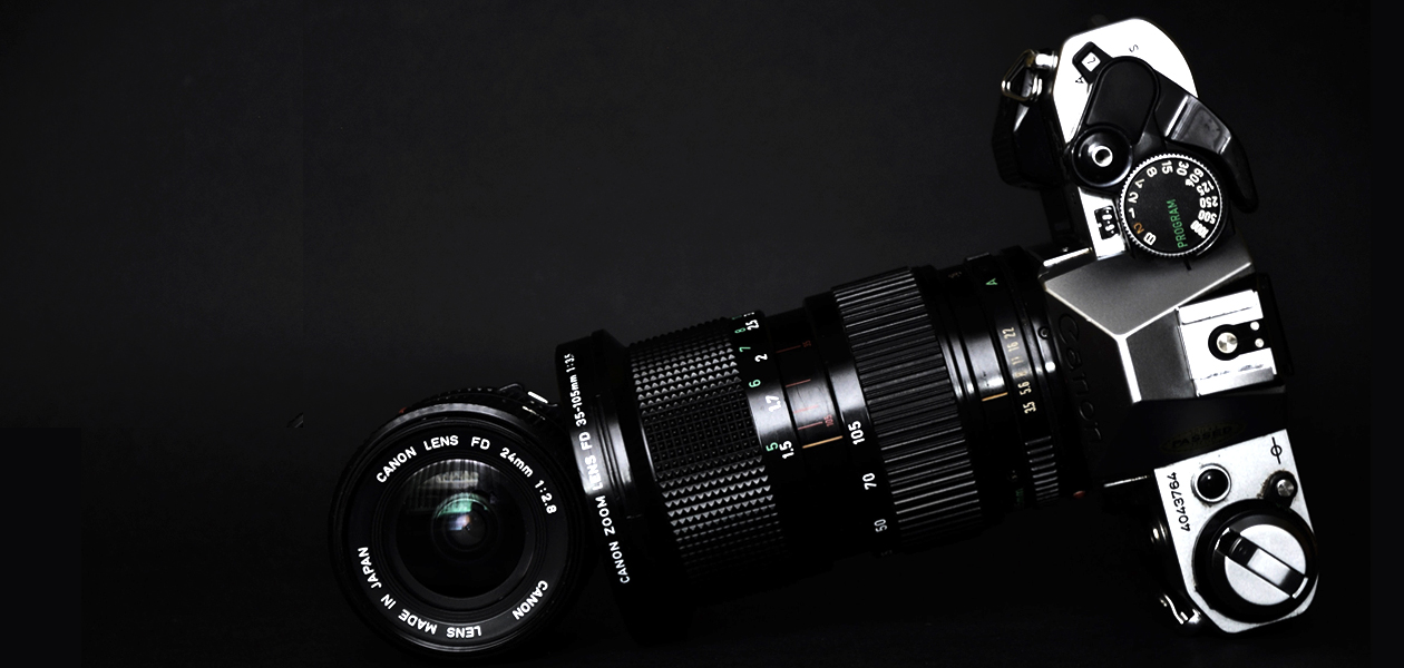 Black Canon camera and lenses