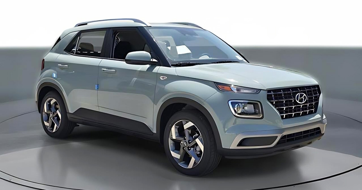A sleek, light gray 2026 Hyundai Venue SEL compact SUV, highlighting a smart and affordable vehicle choice available for under $25,000 on Amazon.