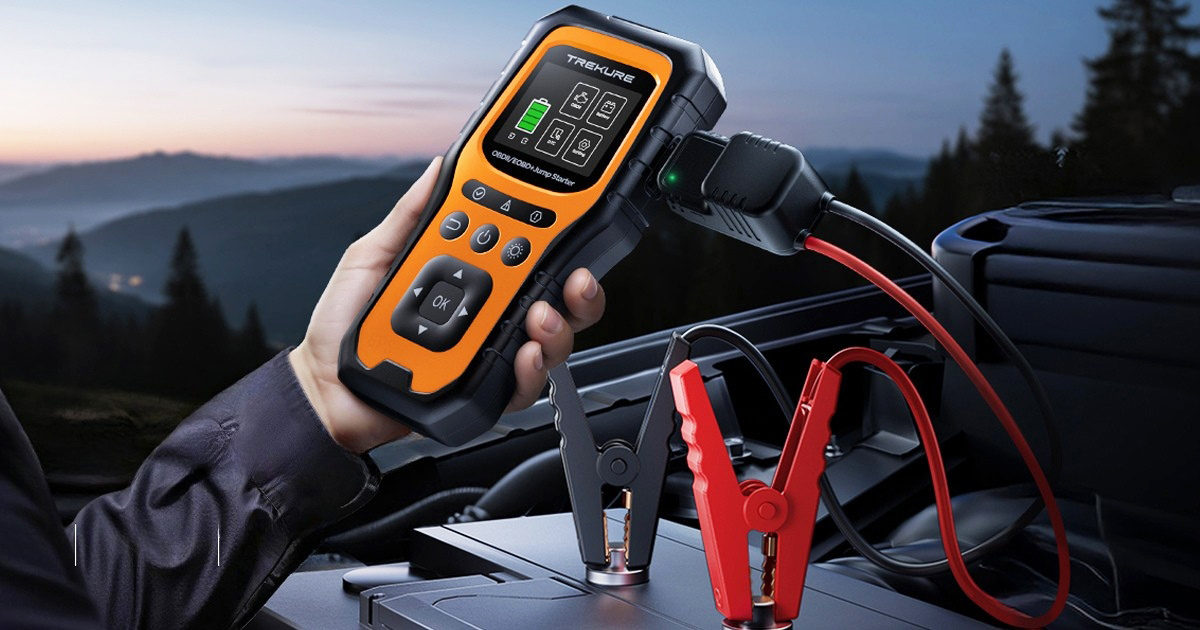 Portable Amazon jump starter with built-in OBD2 scanner connected to a vehicle for diagnostics and battery boosting