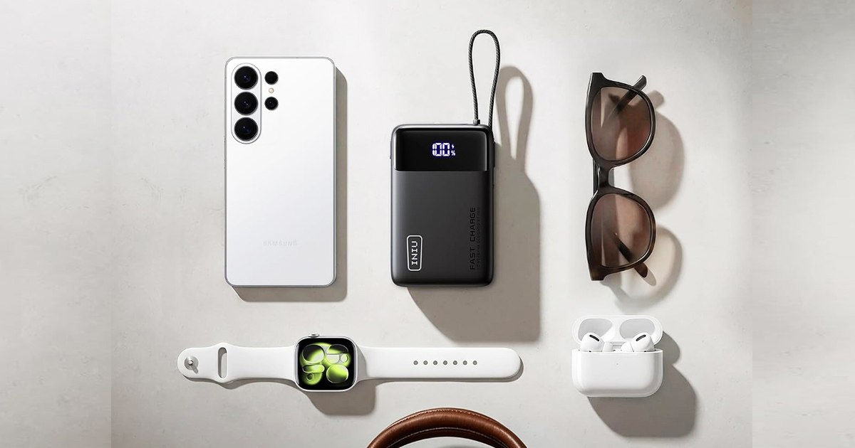 INIU portable travel power bank displayed alongside a smartphone, smartwatch, wireless earbuds, and sunglasses on a clean white surface, highlighting a compact charging accessory for everyday use and travel.