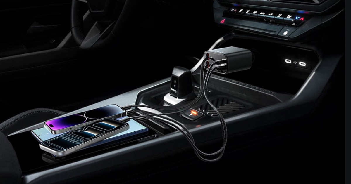 Retractable USB-C car charger plugged into a vehicle console charging multiple smartphones with built-in cables in a modern car interior.