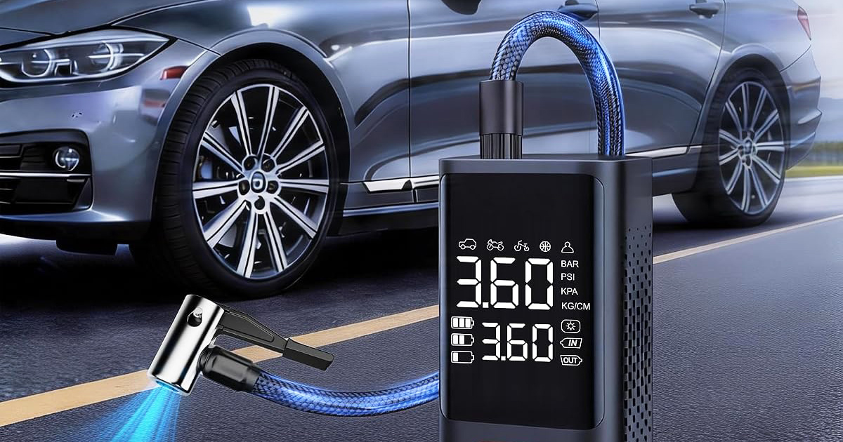 Portable digital tire inflator connected to a car tire with a blue air hose, displaying tire pressure on its digital screen, with a silver car in the background.